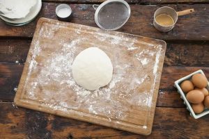 overhead-view-of-dough-on-floured-cutting-board